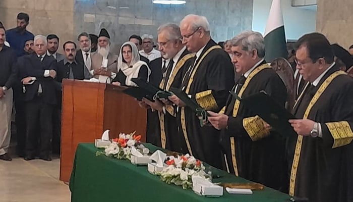 CJP Qazi Faez Isa (left) administers oath to Justices Malik Shahzad Ahmad, Aqeel Abbasi, and Shahid Bilal at the Supreme Court in Islamabad, on June 25, 2024. — Geo.tv via Arfa Feroz Zake