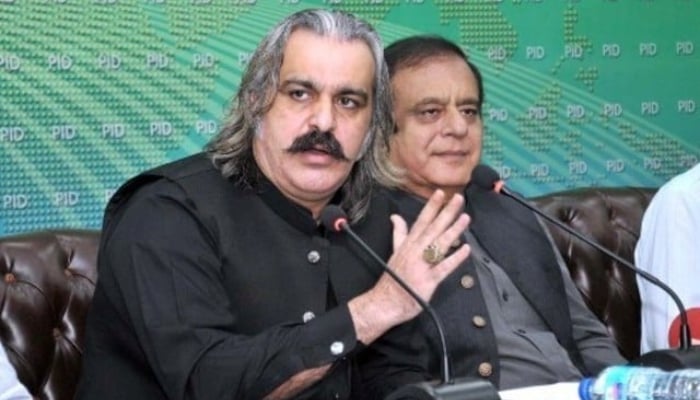 Khyber Pakhtunkhwa Chief Minister Ali Amin Gandapur and PTI leader Shibli Faraz addressing a press conference in Islamabad. — APP/File