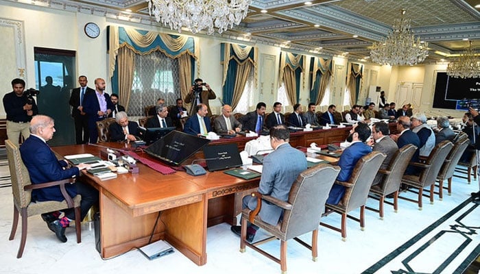 Prime Minister Shehbaz Sharif (left) chairs a federal cabinet meeting in Islamabad on March 28, 2024. —PMO