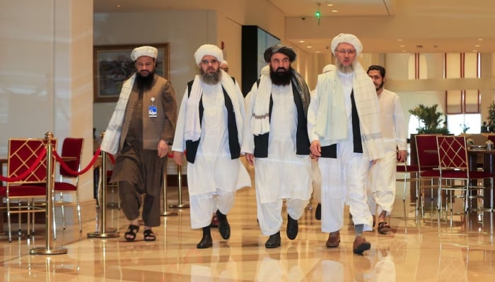 Abdul Salam Hanafi, member of the Taliban negotiating team and the Taliban delegation, arrive for Afghan peace talks in Doha, Qatar, on August 12, 2021. —Reuters