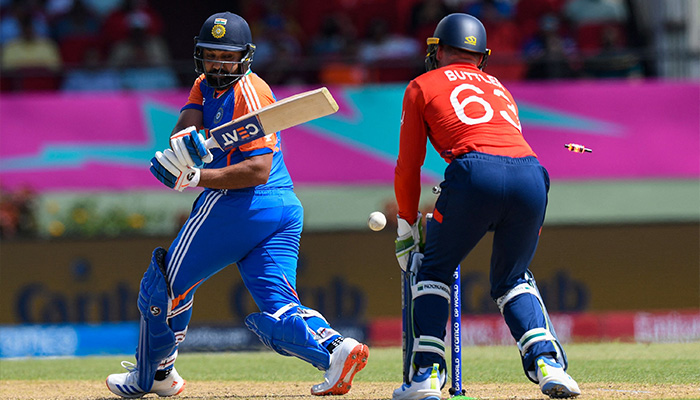 Indias captain Rohit Sharma is bowled by Englands Adil Rashid during the Twenty20 World Cup 2024 semi-final cricket match, India vs England, Providence Stadium, Guyana, June 27, 2024. — AFP