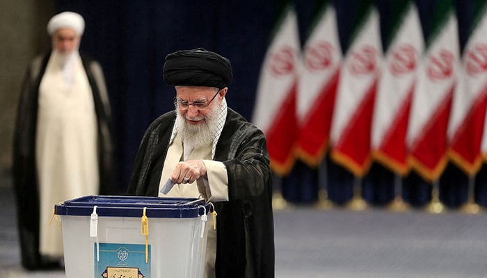 Irans Supreme Leader Ayatollah Ali Khamenei casts his vote during presidential elections in Tehran, Iran June 28, 2024. — Reuters