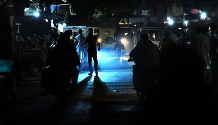 An area in Pakistan drowned in darkness due to a power outage. — AFP/File