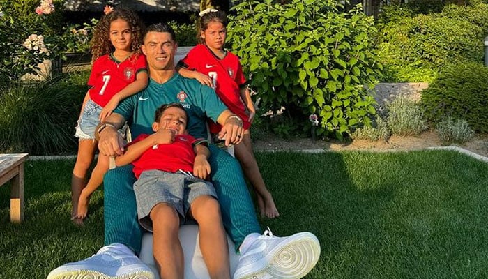 Portuguese player Cristiano Ronaldo spends quality time with his kids as his son sits on his lap while his daughters stand alongside him. — Instagram/cristiano