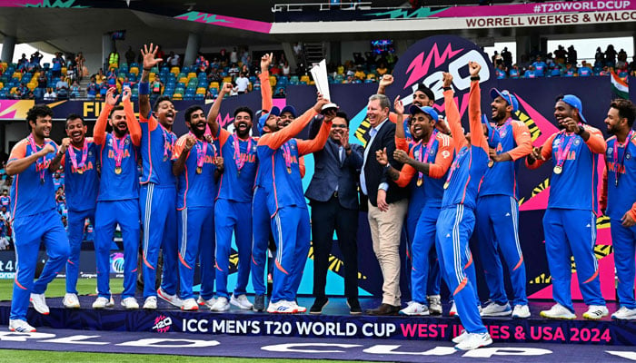 Team India celebrates with the trophy after winning the ICC mens T20 World Cup 2024 final cricket match between India and South Africa at Kensington Oval in Bridgetown, Barbados, on June 29, 2024. — AFP