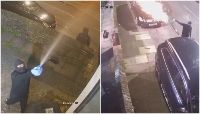 Masked men attempt to set fire to independent candidate Talat Sajawal's banner at a house in Bradford. — Screenshot/CCTV images/reporter