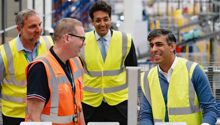 UK Prime Minister Rishi Sunak interacts with workers at the Bestway Healthcare Service Centre in Stoke on Trent, London, UK on July 1, 2024. — Photo by author
