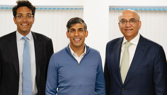 UK Prime Minister Rishi Sunak (centre) can be seen with Bestway Groups British-Pakistani Chief Executive Lord Zameer Choudrey (right) and his son Haider Choudrey, at Bestway Healthcare Service Centre in Stoke on Trent, London, UK on July 1, 2024. — Photo by author