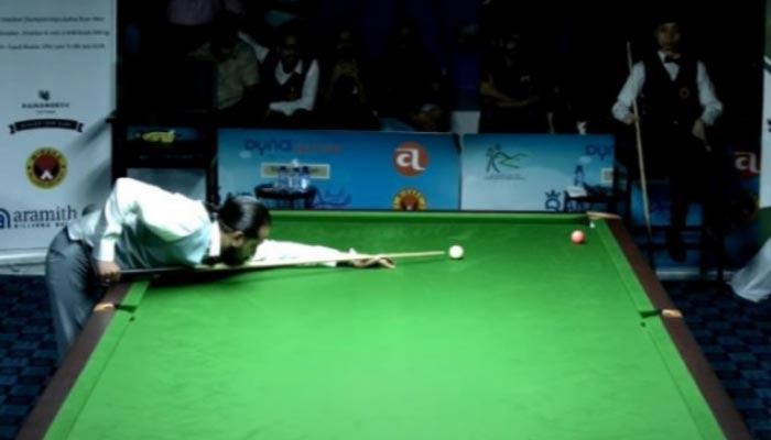 Pakistans Muhammad Awais can be seen playing a snooker. — Reporter