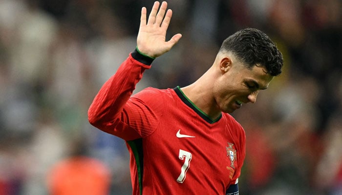 Portugals forward Cristiano Ronaldo reacts after winning the UEFA Euro 2024 round of 16 football match between against Slovenia at the Frankfurt Arena in Frankfurt am Main, Germany on July 1, 2024. — AFP