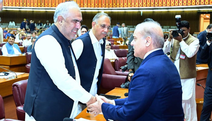 Prime Minister Shehbaz Sharif interacts with oppostion members during a session of the National Assembly, in Islamabad on June 26, 2024. —PMO