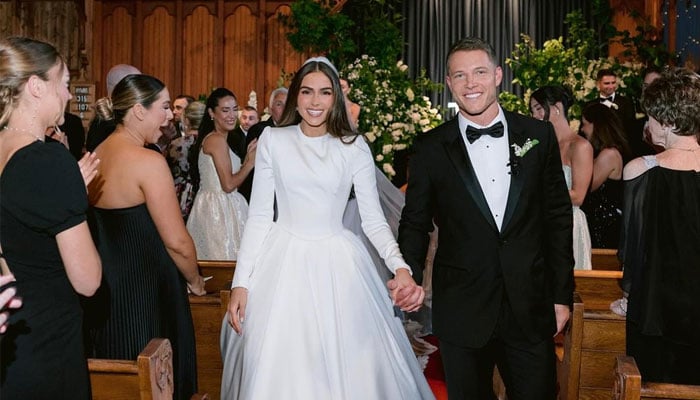 Olivia Culpos groom Christian McCaffrey claps back at wedding dress critic