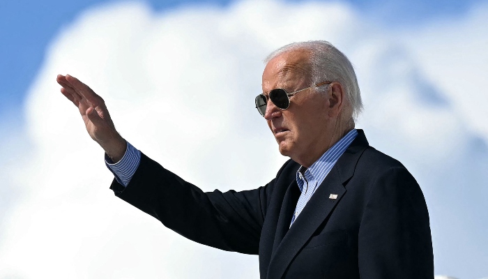 US President Joe Biden waves as he boards Air Force One prior to departure from Dane County Regional Airport in Madison, Wisconsin, USA, on July 5, 2024, as he travels to Wisconsin for campaign events. —AFP