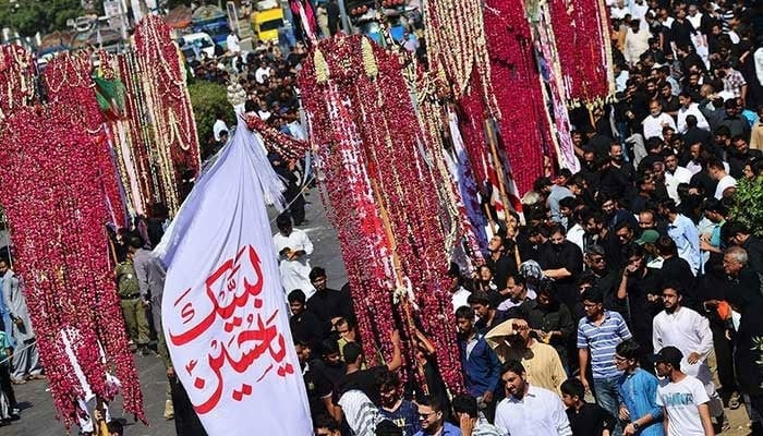 A large number of mourners attending the 9th Muharram procession in Islamabad. — APP/File