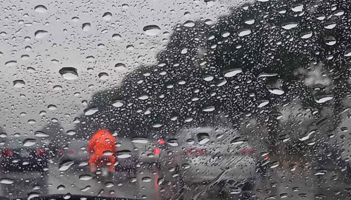 A view of rain drops on windscreen of car during rain in Islamabad, Pakistan on June 5, 2024. — INP