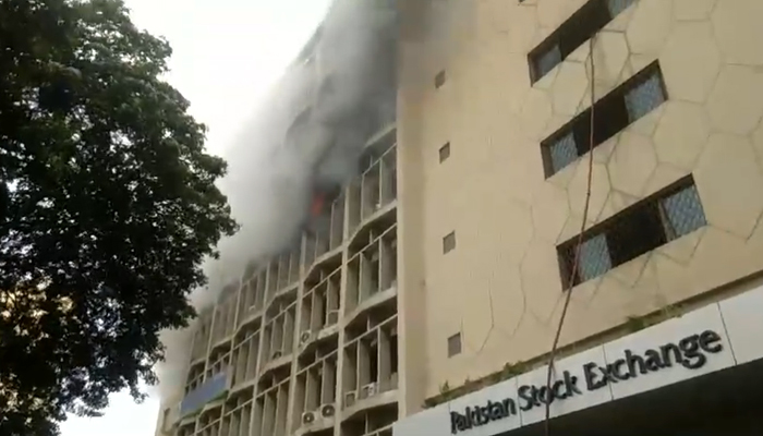 Smoke arises from the fourth floor of the PSX building in Karachi on July 8, 2024. — Reporter