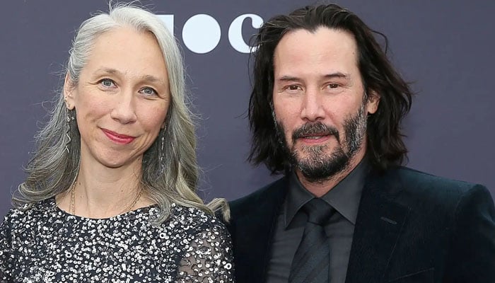 Keanu Reeves seems happy with girlfriend Alexandra in rare appearance