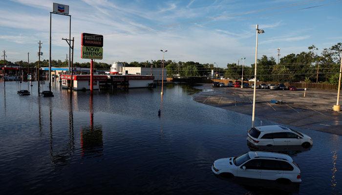 Cars and buildings are partially submerged in floodwaters in the aftermath of Hurricane Beryl, in Houston, Texas, July 8, 2024. —Reuters