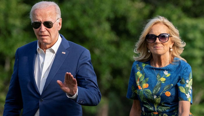 US President Joe Biden and first lady Jill Biden walk after stepping off Marine One following their arrival on the South Lawn of the White House in Washington, US July 7, 2024. — Reuters