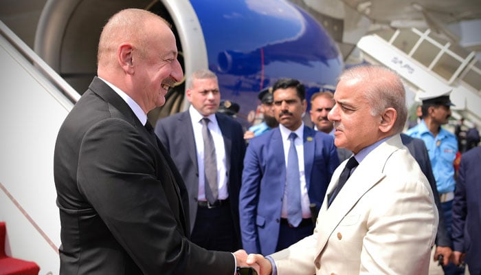 PM Shehbaz Sharif shakes hands with Azerbaijans President Ilham Aliyev in Islamabad on July 11, 2024. — PMO