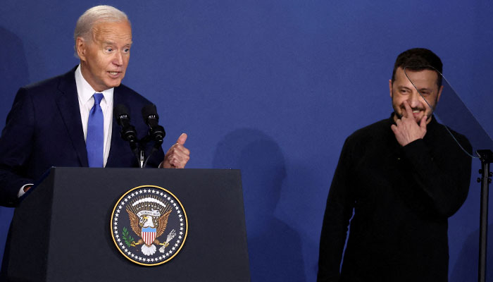 This picture shows Ukraines President Volodymyr Zelenskiy as he listens to US President Joe Biden speak at a Ukraine Compact meeting, on the sidelines of the NATOs 75th anniversary summit in Washington, July 11, 2024. — Reuters