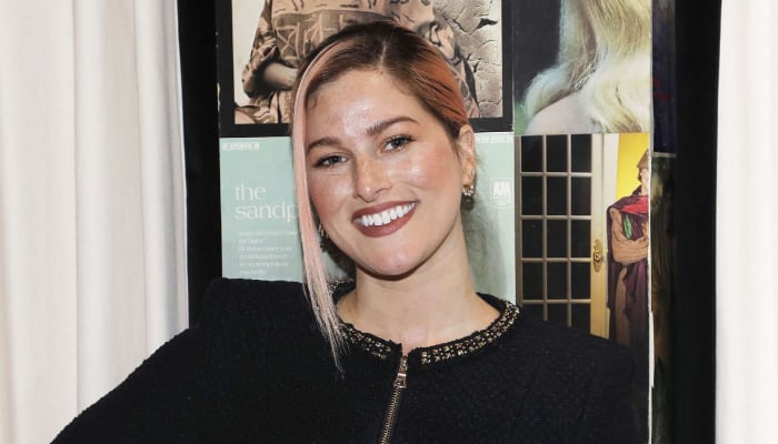 Country musician Cassadee Pope has switched to rock music