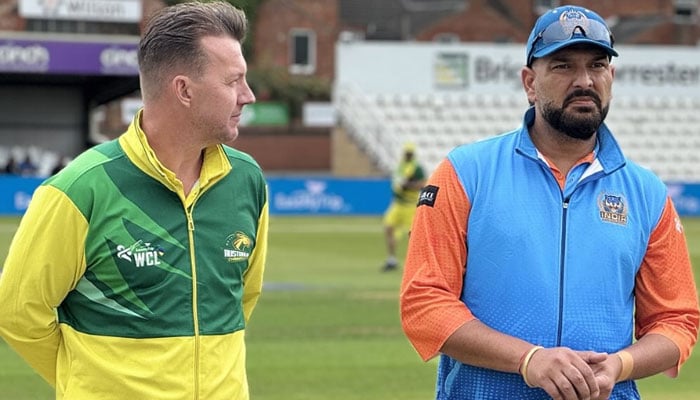 Brett Lee (L) and Yuvraj Singh during the toss. — World Championship of Legends 2024