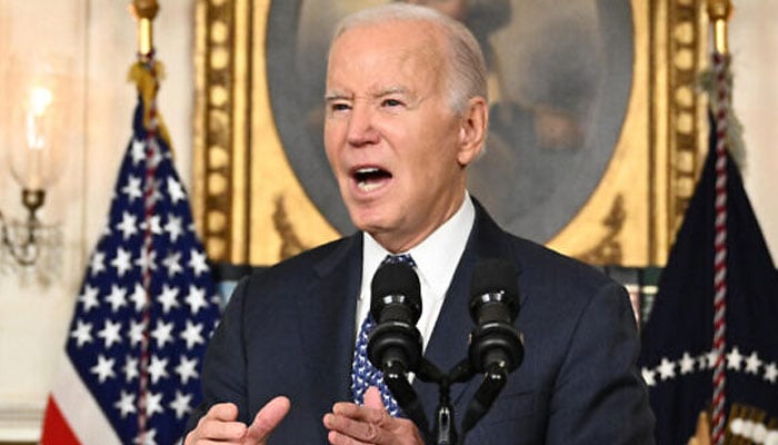 US President Joe Biden answers questions about Israel after speaking about the Special Counsel report at the White House in Washington, on February 8, 2024. — AFP