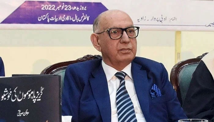 Senator Irfan Siddiqui sits on stage during a launch ceremony for his book at Academy of Letters in Islamabad. — Online/File