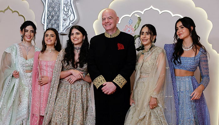 FIFA president Gianni Infantino, his wife Leena Al Ashqar and their children pose for pictures on the red carpet on the day of the wedding of Anant Ambani and Radhika Merchant in Mumbai, India, July 12, 2024. — Reuters