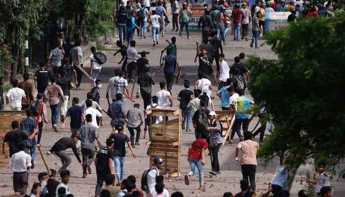 Bangladesh Chhatra League, the student wing of the ruling party Bangladesh Awami League, and anti-quota protesters engage in a clash at the Dhaka College area, in Dhaka, Bangladesh, July 16, 2024. — Reuters