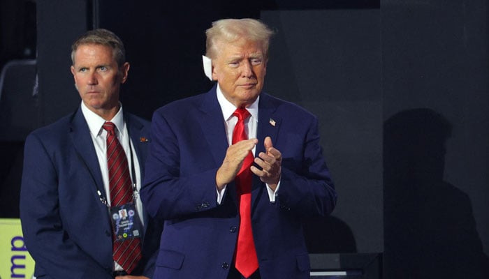 Republican presidential nominee and former US President Donald Trump applauds during Day 1 of the Republican National Convention (RNC), at the Fiserv Forum in Milwaukee, Wisconsin, US, July 15, 2024. — Reuters