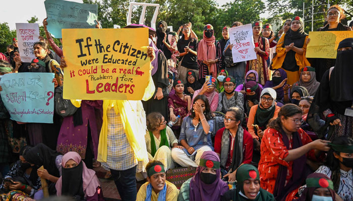 Anti-quota protesters hold placards during a demonstration on Dhaka University campus in Dhaka on July 16, 2024. — AFP