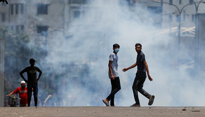 Police fire teargas during a clash between anti-quota supporters, police and Awami League supporters at the Rampura area in Dhaka, Bangladesh, July 18, 2024. — Reuters