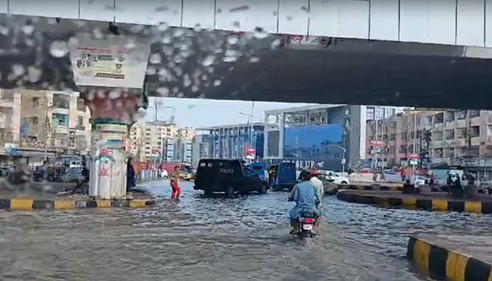 Commuters can be seen on the roads of Karachi after the city received rain on July 19, 2024. — Screengrab/Geo.tv