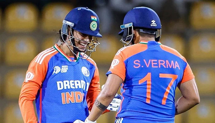 Smriti Mandhana (L) and Shefali Verma share a moment during the match against Pakistan. — ACC