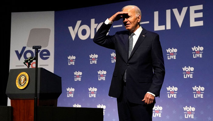 US President Joe Biden gestures near the podium during the Vote To Live Properity Summit at the College of Southern Nevada in Las Vegas, Nevada, on July 16, 2024. —AFP