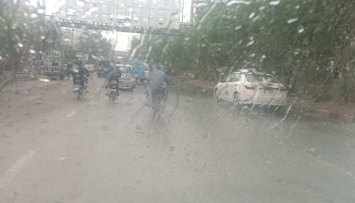 An image of a cars windscreen during rain in Karachi on July 21, 2024. — Geo.tv