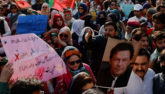 Supporters of former PTI founder and former prime minister Imran Khan gather during a protest demanding free and fair results of the elections in Karachi. — Reuters