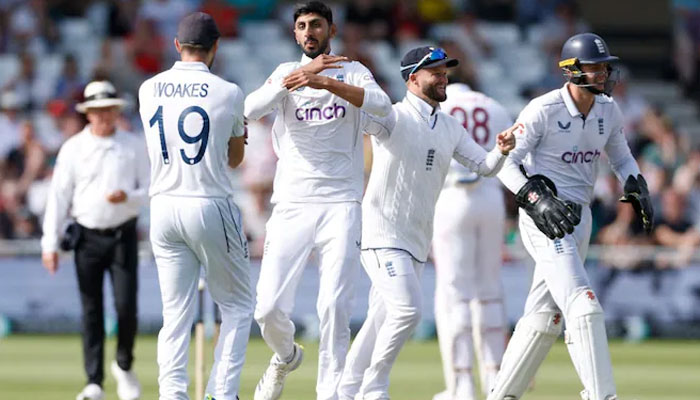 English players seen celebrating after taking a wicket against West Indies.— Reuters/file