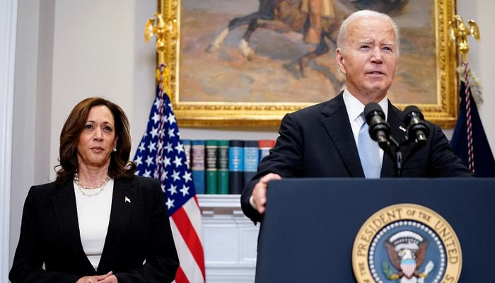 US President Joe Biden speaks next to Vice-President Kamala Harris as he delivers a statement at the White House on July 14, 2024. — Reuters