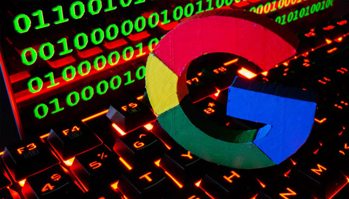 A 3D printed Google logo is pictured on a keyboard in front of binary code in this illustration taken September 24, 2021. — Reuters