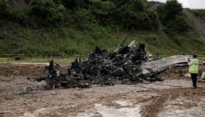 The accident site of a Saurya Airlines plane that caught fire after skidding off the runway while taking off is cordoned at Tribhuvan International Airport, in Kathmandu, Nepal on July 24, 2024. — Reuters