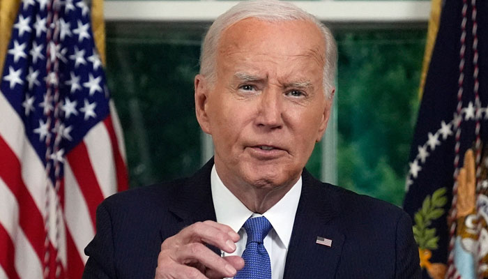 US President Joe Biden speaks during an address to the nation about his decision to not seek reelection, in the Oval Office at the White House in Washington, DC, on July 24, 2024. — AFP