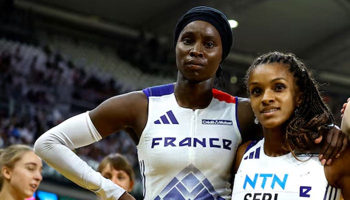 Frances Sounkamba Sylla (left) and Camille Seri after participating in Womens 4x400m Relay Heats for the World Athletics Championship at National Athletics Centre, Budapest, Hungary on August 26, 2023. — Reuters