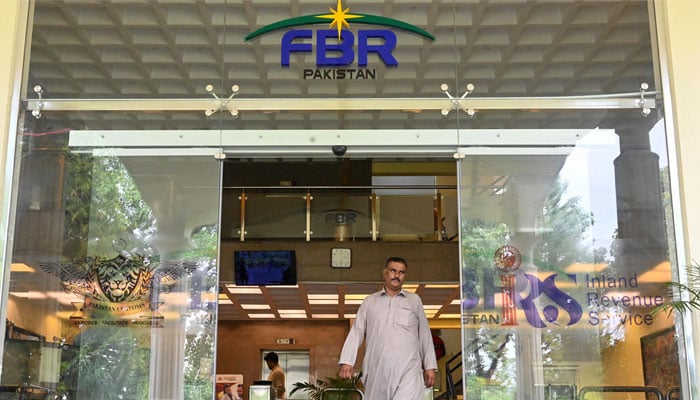 A man walks out of the Federal Board of Revenue (FBR) office in Islamabad on July 4, 2024. — AFP