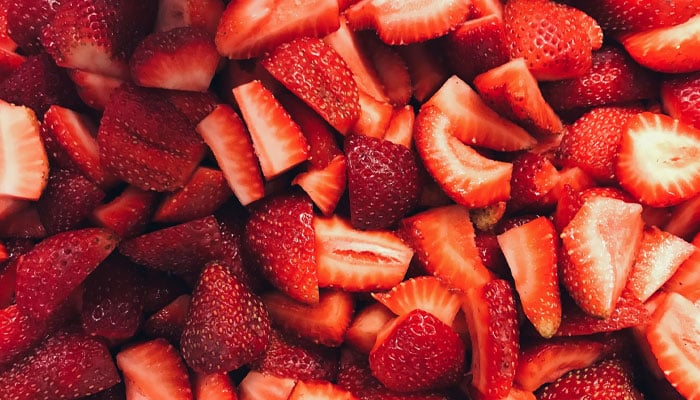 A close-up image of sliced strawberries. — Unsplash/File