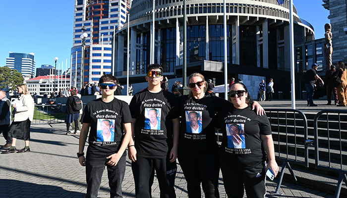 Family members of Gary Gerbes, founder of the Mongrel Mob gang, gather ahead of the release of the Royal Commission into Abuse in Care outside New Zealands Parliament House in Wellington, New Zealand July 24, 2024. — Reuters