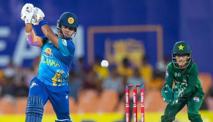 Chamari Athapaththu of Sri Lanka plays a shot while Muneeba Ali of Pakistan keeps the wickets during the second innings of the second semi-final of Womens T20 Asia Cup at Rangiri Dambulla International Stadium, Dambulla, Sri Lanka on July 26, 2024. — ACC