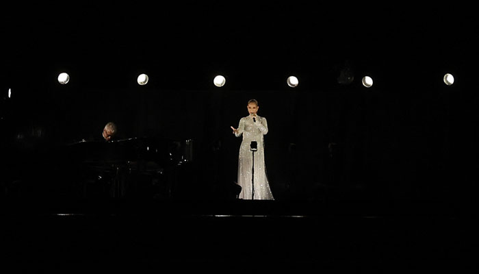 Céline Dion while performing in the Olympics Opening Ceremony. —Reuters